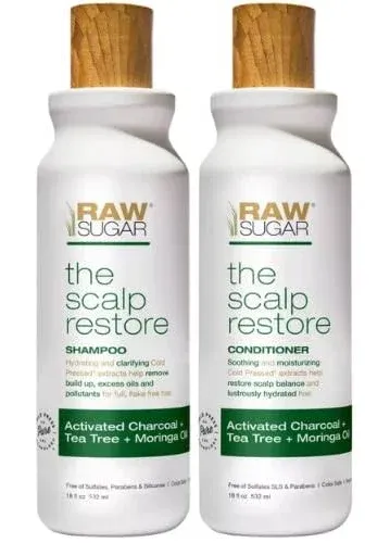 Raw Sugar The Cold Pressed Shampoo and Conditioner Set - Activated Charcoal, Tea Tree, and Moringa Oil. Balances Scalp, Removes Build-Up and Pollutants. 18 Fl Oz Bottles.