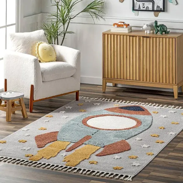 Brooklyn Rug Co Journee Rocket Ship High-Low Kids Tasseled Area Rug.